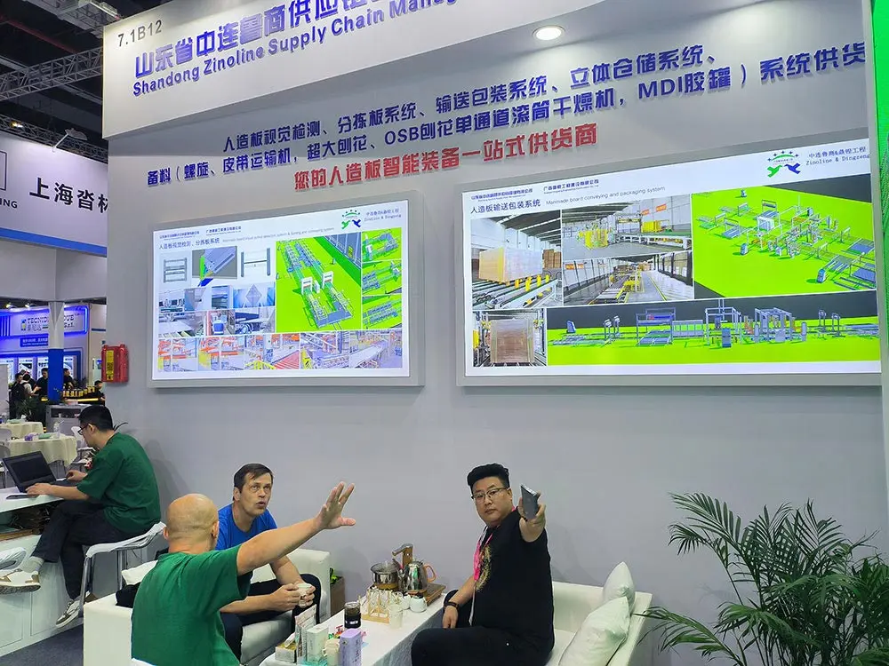 Russia Clients Discussing The Technology And Business Of Automatic Packaging Line For Manmade Board Industry In Woodworking Exhibition