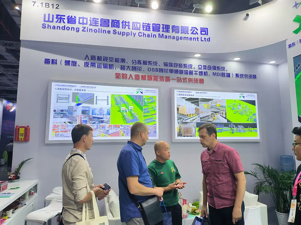 Russia Clients Discussing The Technology And Business Of Automatic Packaging Line For Manmade Board Industry In Woodworking Exhibition