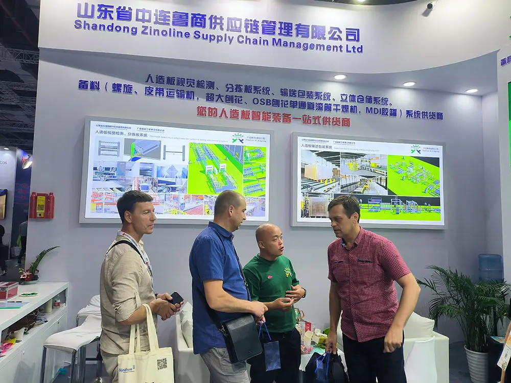Russia Clients Discussing The Technology And Business Of Automatic Packaging Line For Manmade Board Industry In Woodworking Exhibition