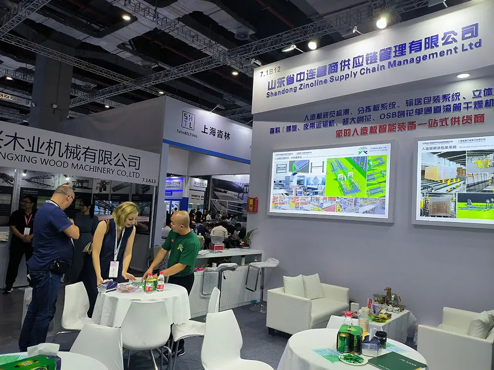 Russia Clients Discussing The Technology And Business Of Automatic Packaging Line For Manmade Board Industry In Woodworking Exhibition