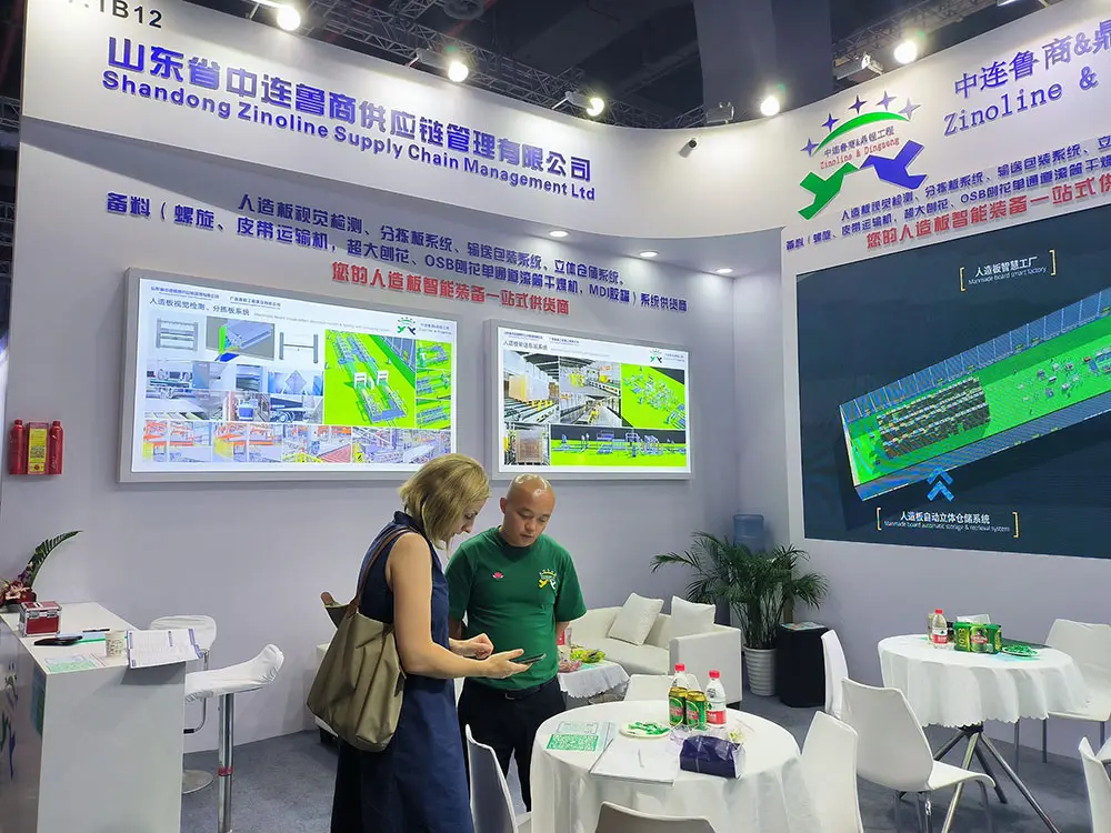 Russia Clients Discussing The Technology And Business Of Automatic Packaging Line For Manmade Board Industry In Woodworking Exhibition